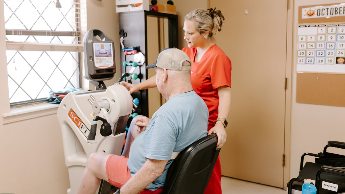 Elder Doing Physical Therapy with Staff Member at Conway Healthcare and Rehabilitation Center